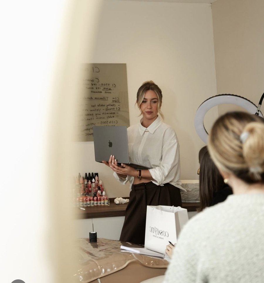 Megan teaching a small group at the Cosmegtic studio